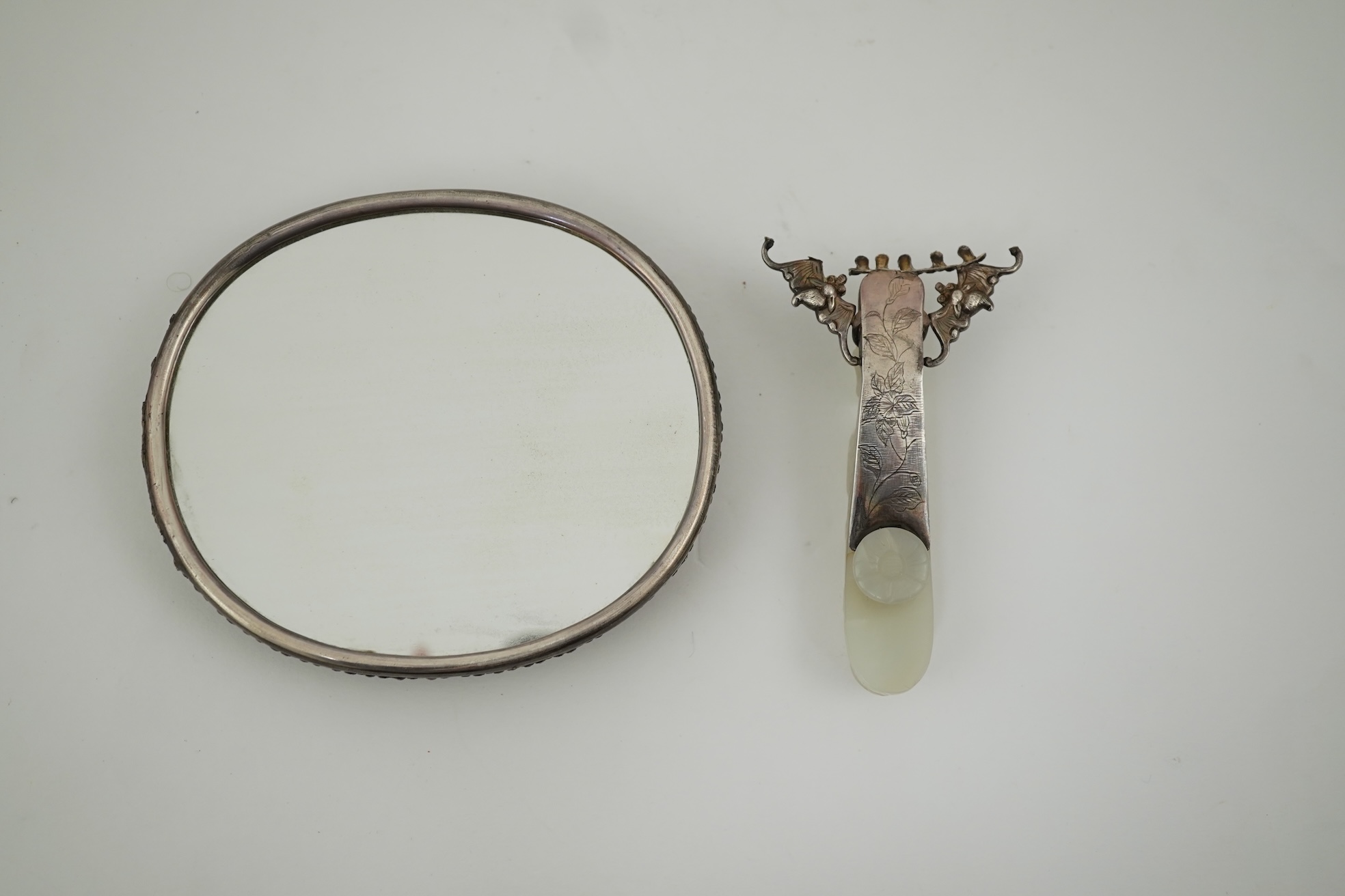 A Chinese jade and cabochon mounted hand mirror, the jade 18th/19th century